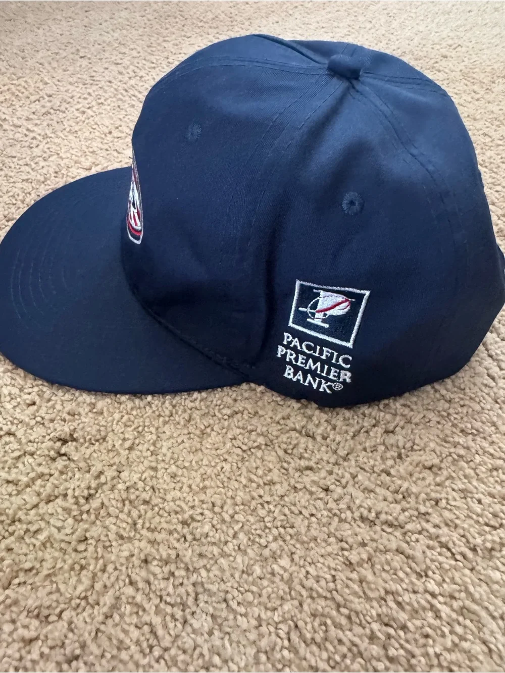 NWOT Anaheim Ducks red, white and blue hat with American Flag Print.